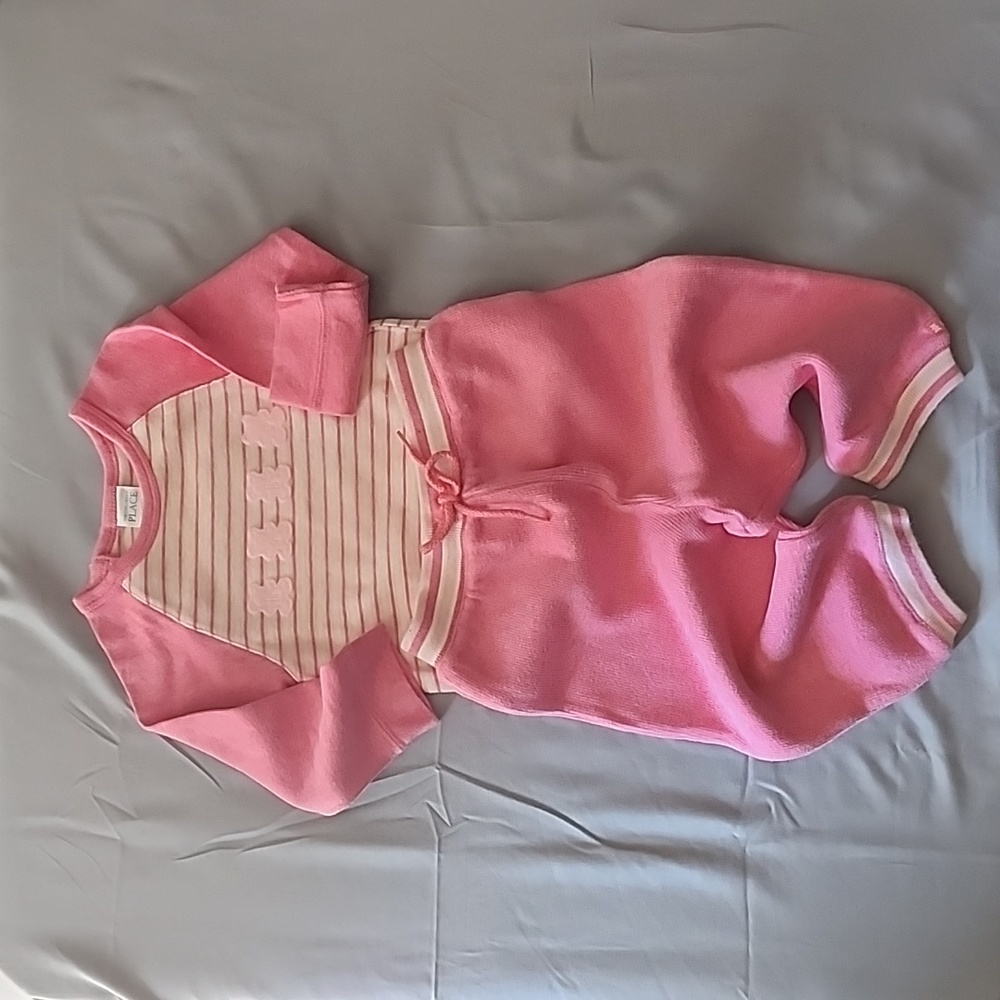 The Children's Place pink and tan two-piece jogger set. Size: 12 months